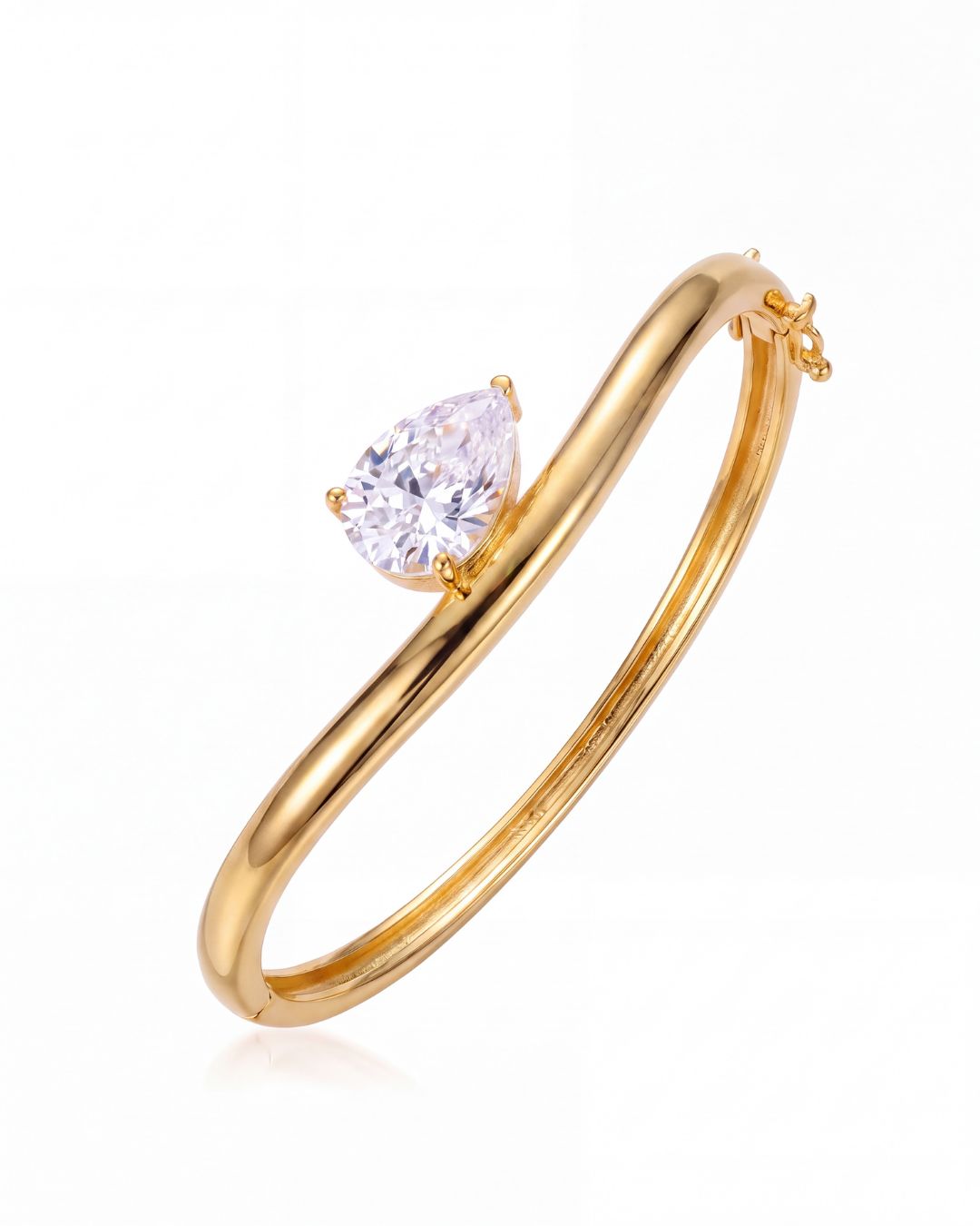 Alba Bangle Kada Bracelet laid flat showing the smooth polished silhouette