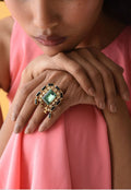 DANCING PEACOCK: The Swarovski baguette studded dancing ring