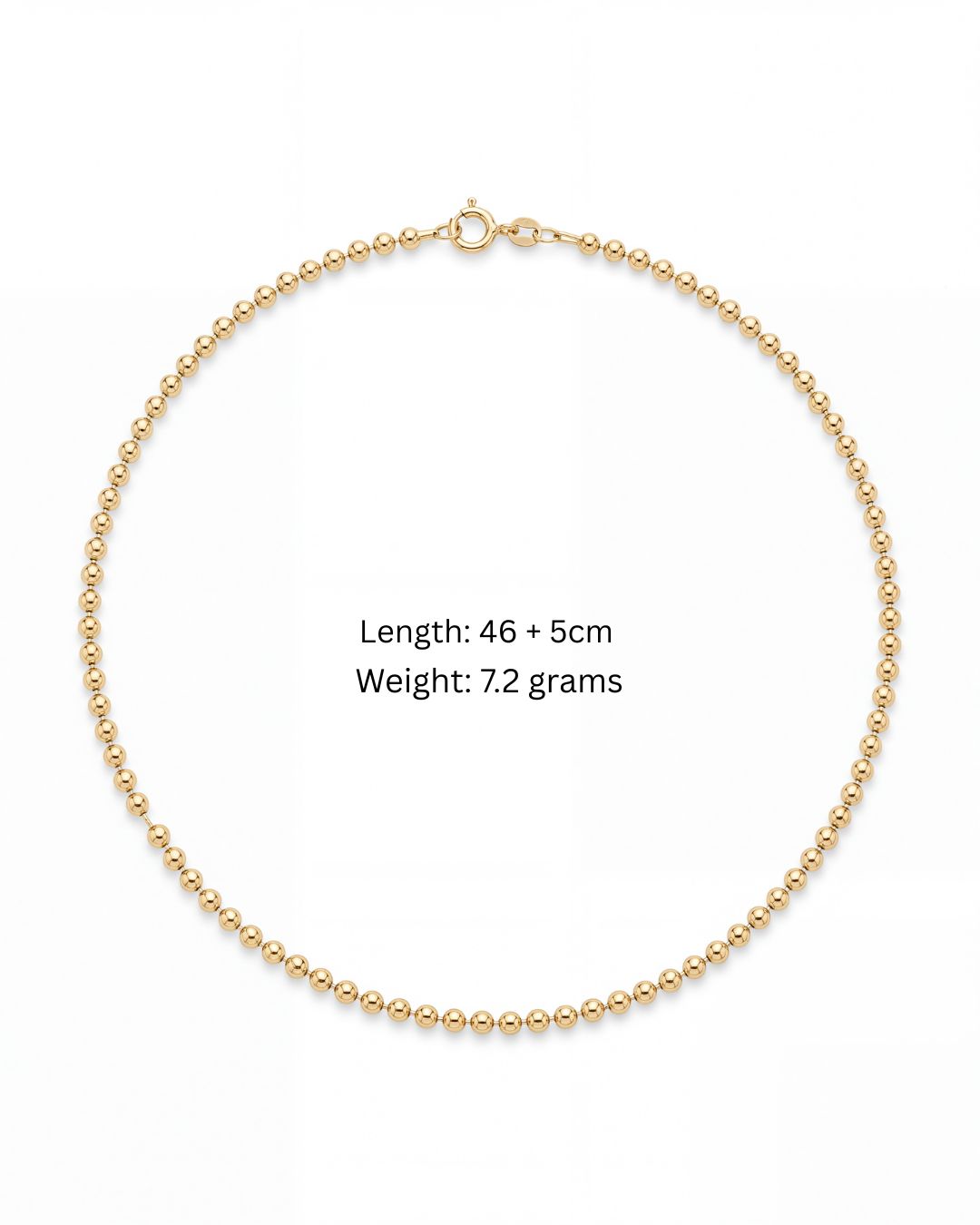 Cleo Beaded Chain laid flat showing the continuous polished gold bead strand