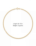 Cleo Beaded Chain laid flat showing the continuous polished gold bead strand