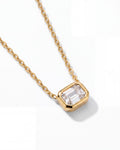 Ciel Pendant close-up of the emerald-cut crystal in its gold setting