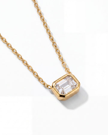 Ciel Pendant close-up of the emerald-cut crystal in its gold setting