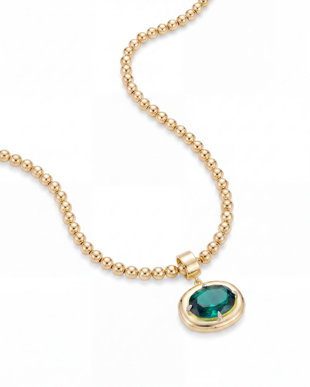 Cleo Beaded Chain laid flat showing the continuous polished gold bead strand