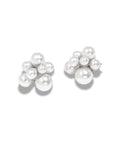 The Pearl Bloom Studs laid flat against a plain background