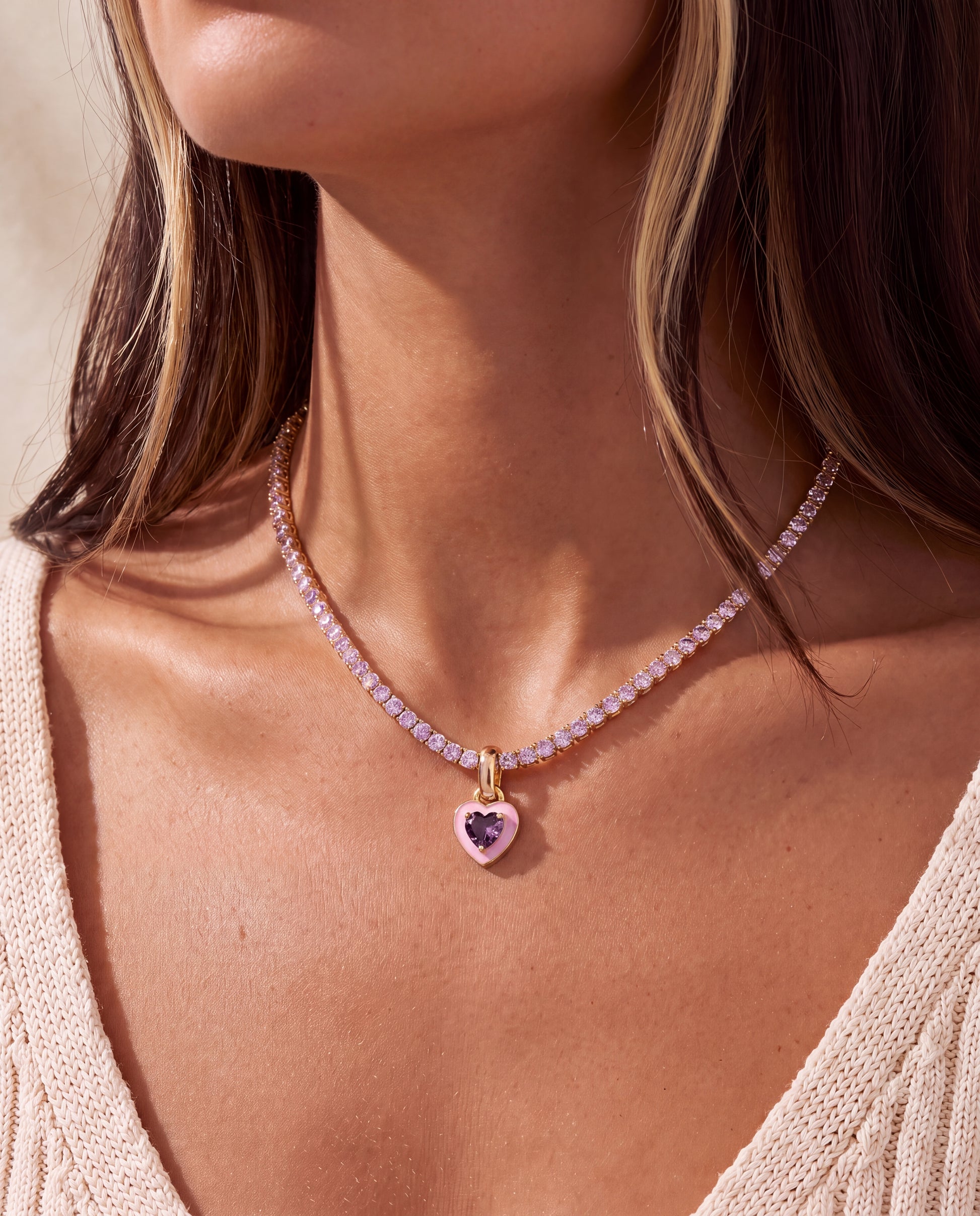 Cherie Pendant worn layered with a fine gold chain