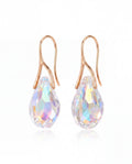 Vesper Drop Earrings worn on the ear, front view