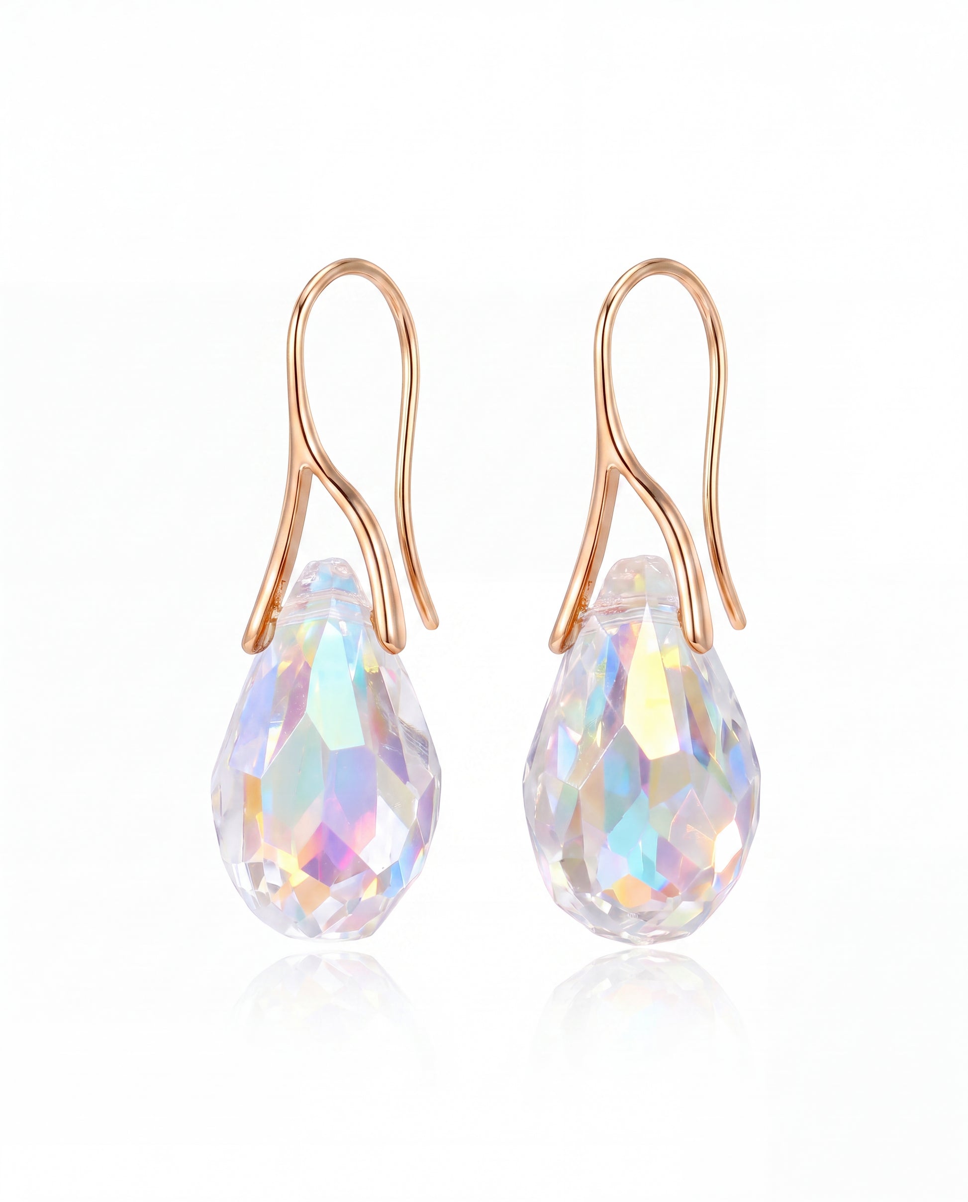 Vesper Drop Earrings worn on the ear, front view