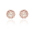 SETTING SUN: Round, mystical and grand Swarovski ear studs