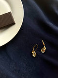 THE KILIG EARRINGS
